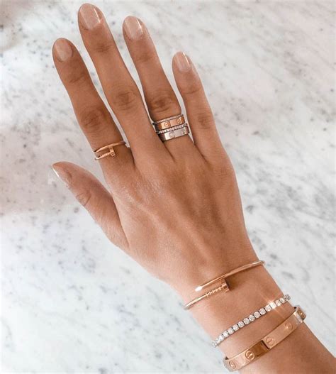 cartier band rings - cartier ring on finger.